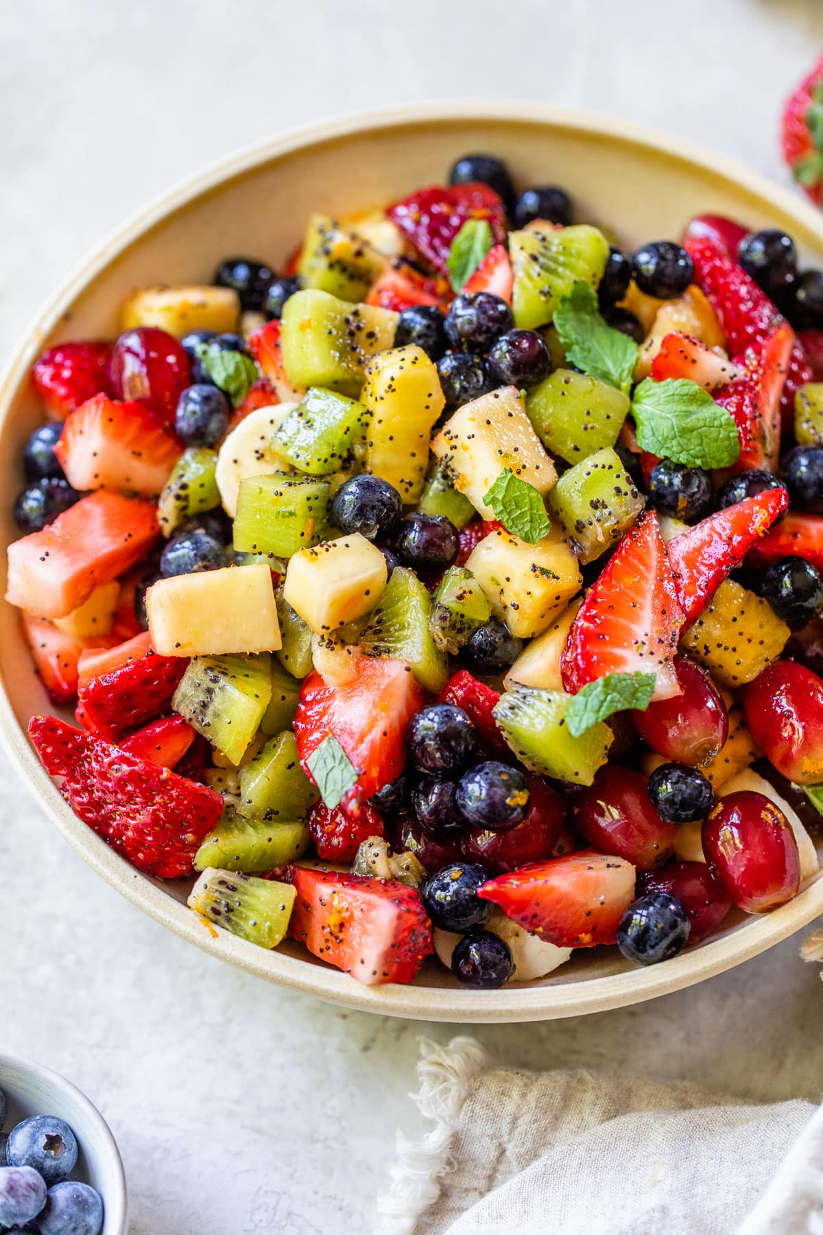 mixed fruit salad with kiwi, strawberries, and blueberries