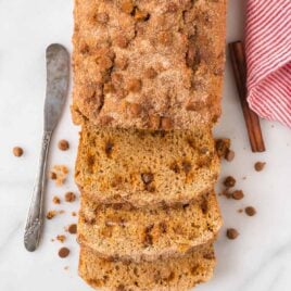 This moist, tender Snickerdoodle Bread is pure heaven! Made with Greek yogurt, cinnamon chips, and an incredible cinnamon sugar topping. An easy, healthy recipe without sour cream. Bake as mini loaves or a single loaf. Perfect for breakfast, special treats, and even dessert. #snickerdoodle #bread #easy #healthy