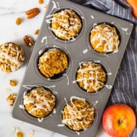 Moist Apple Carrot Muffins. An easy and healthy recipe with no sugar! Made with oatmeal, Greek yogurt, and maple syrup, they are naturally sweetened, filling, and great for healthy breakfasts and snacks. A favorite for toddlers AND for adults!