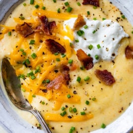 a bowl with loaded crockpot potato soup without heavy cream