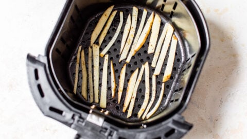 Potato slices in a kitchen appliance basket