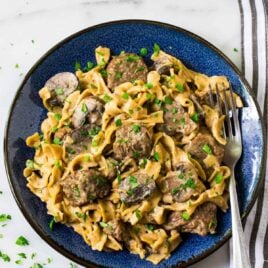 Instant Pot Beef Stroganoff. No canned soup! Easy, healthy beef stroganoff from scratch in the electric pressure cooker. Recipe uses Greek yogurt instead of sour cream and whole wheat noodles.